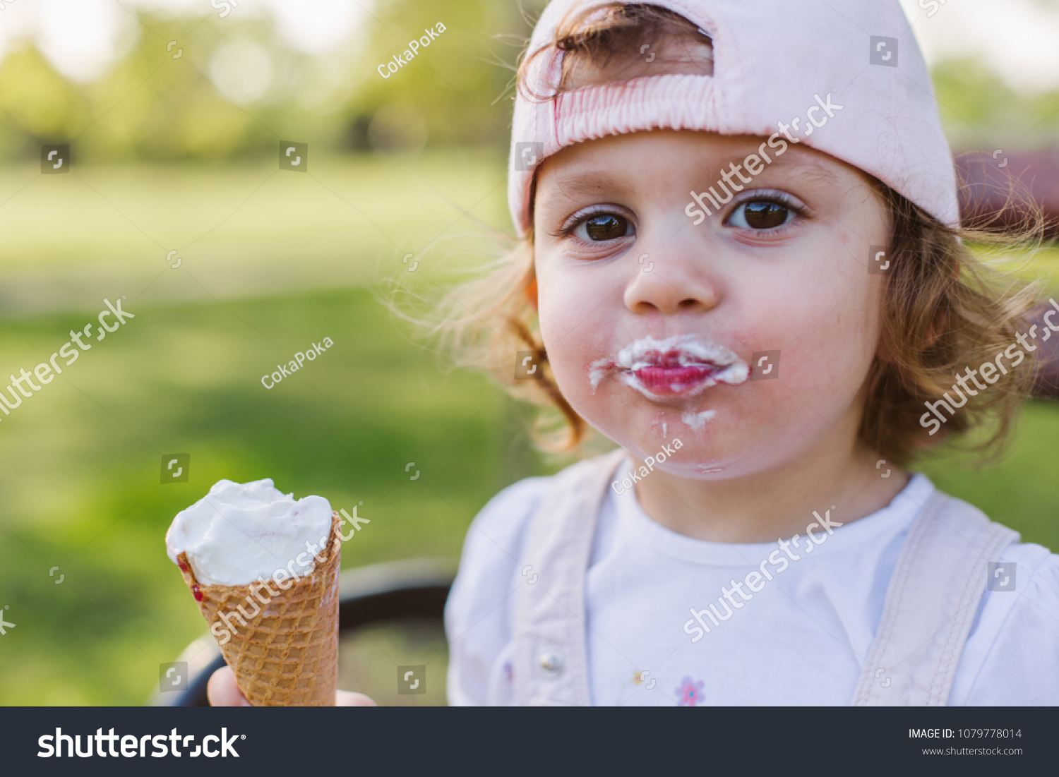 Cute Little Girl Eating Ice Cream Stock Photo 1079778014 