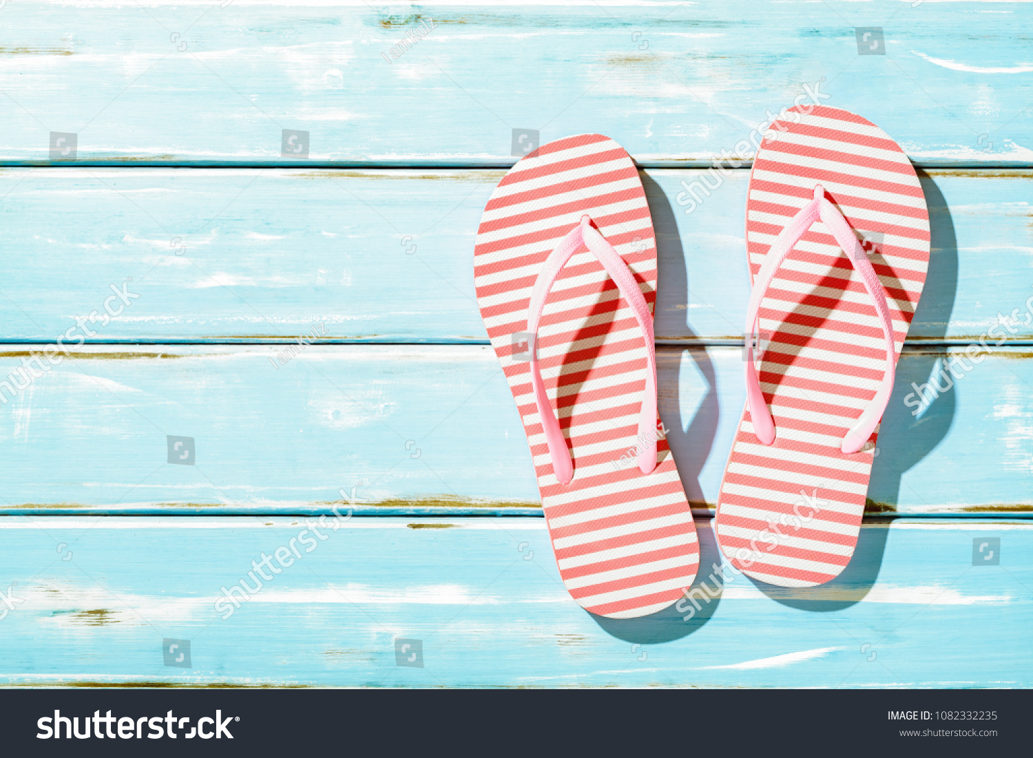 Pink Beach Flip Flop On Wooden Stock Photo 1082332235 | Shutterstock