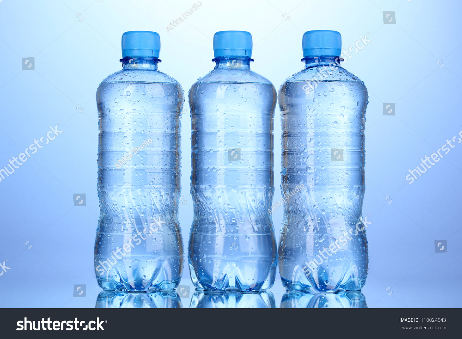 Plastic Bottles Water On Blue Background Stock Photo 110024543 ...