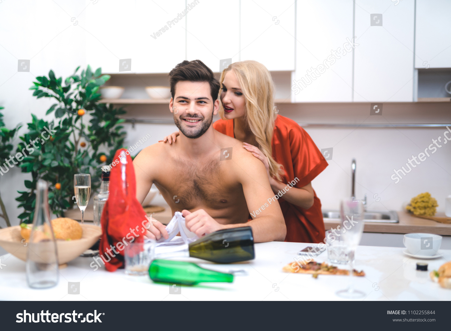 Smiling Young Lovers Flirts Home Party