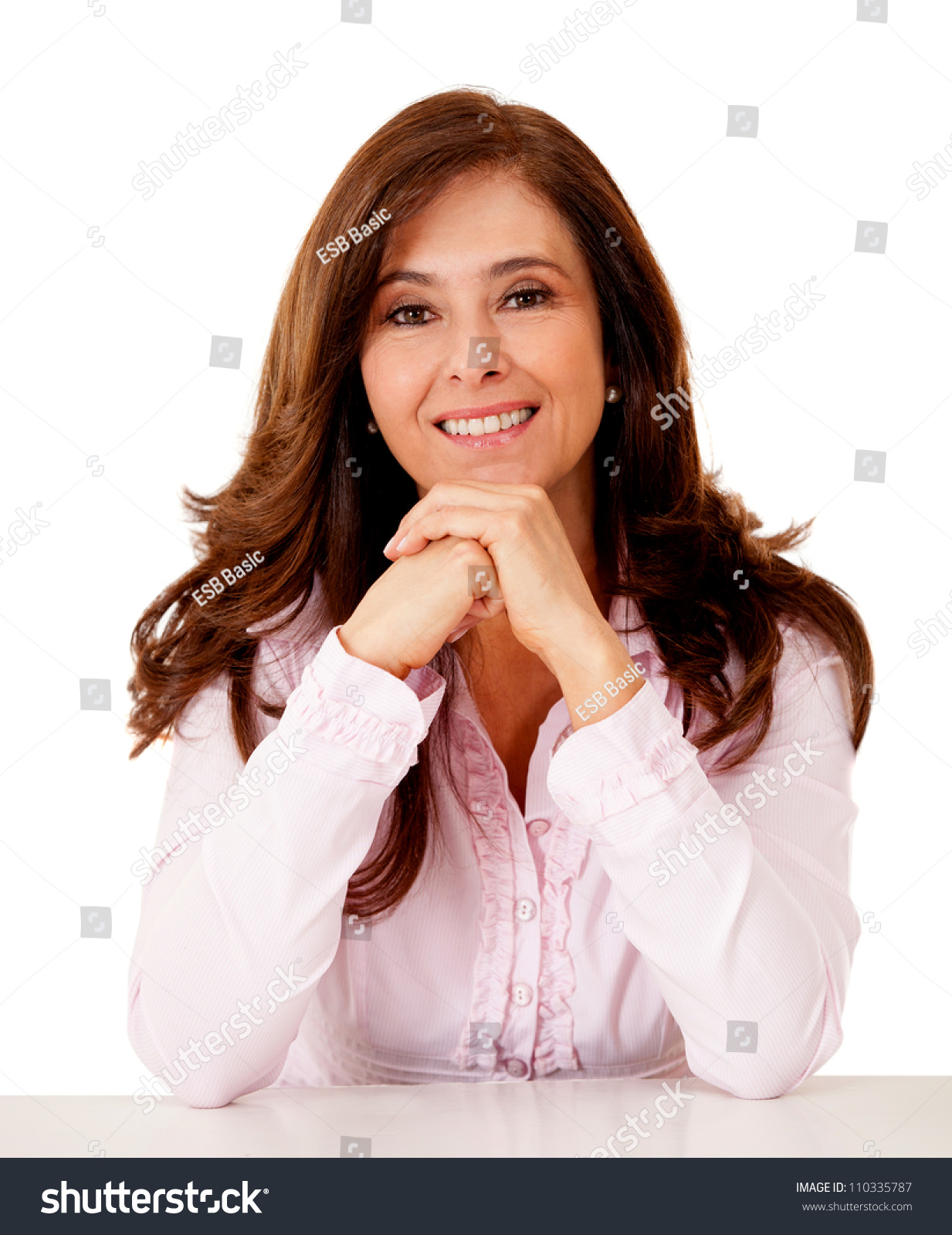 Confident Businesswoman Sitting On Her Desk Stock Photo 110335787 ...