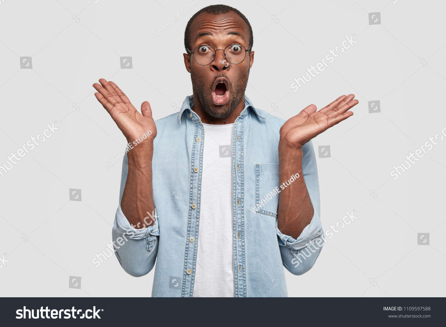 Amazed Handsome Male Dark Skin Shrugs Stock Photo 1109597588 | Shutterstock