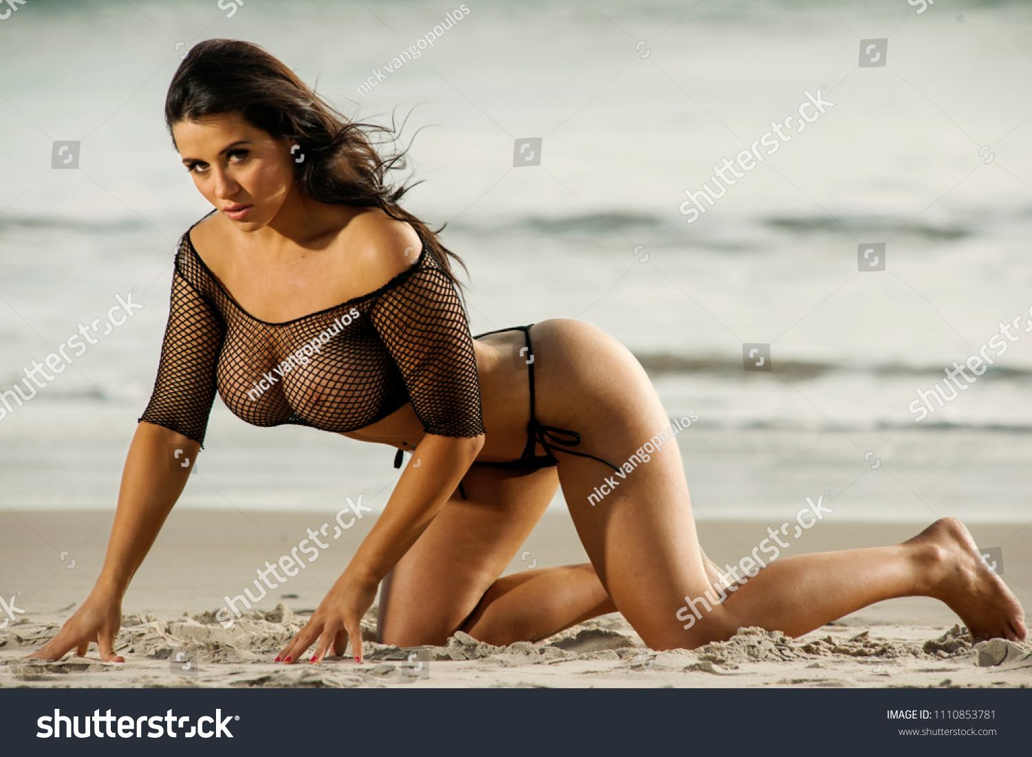 String Bikinis On The Beach Topless
