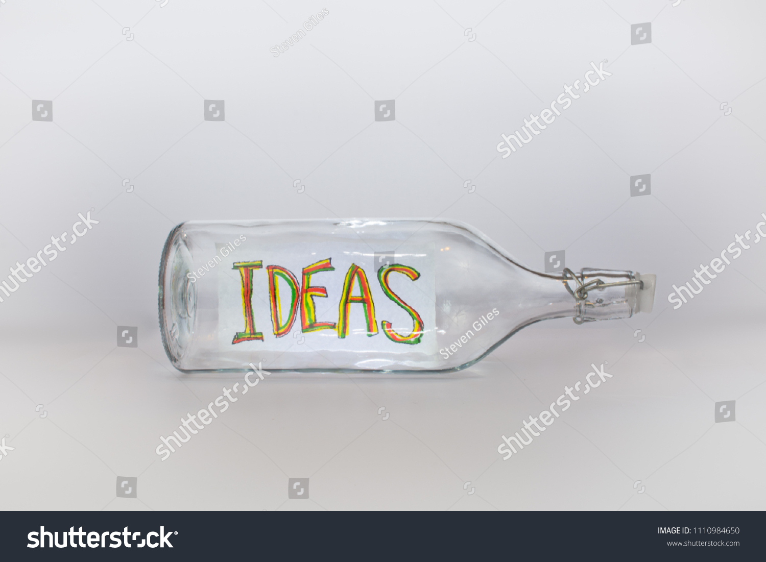 Bottled Ideas On Plain White Background Stock Photo 1110984650