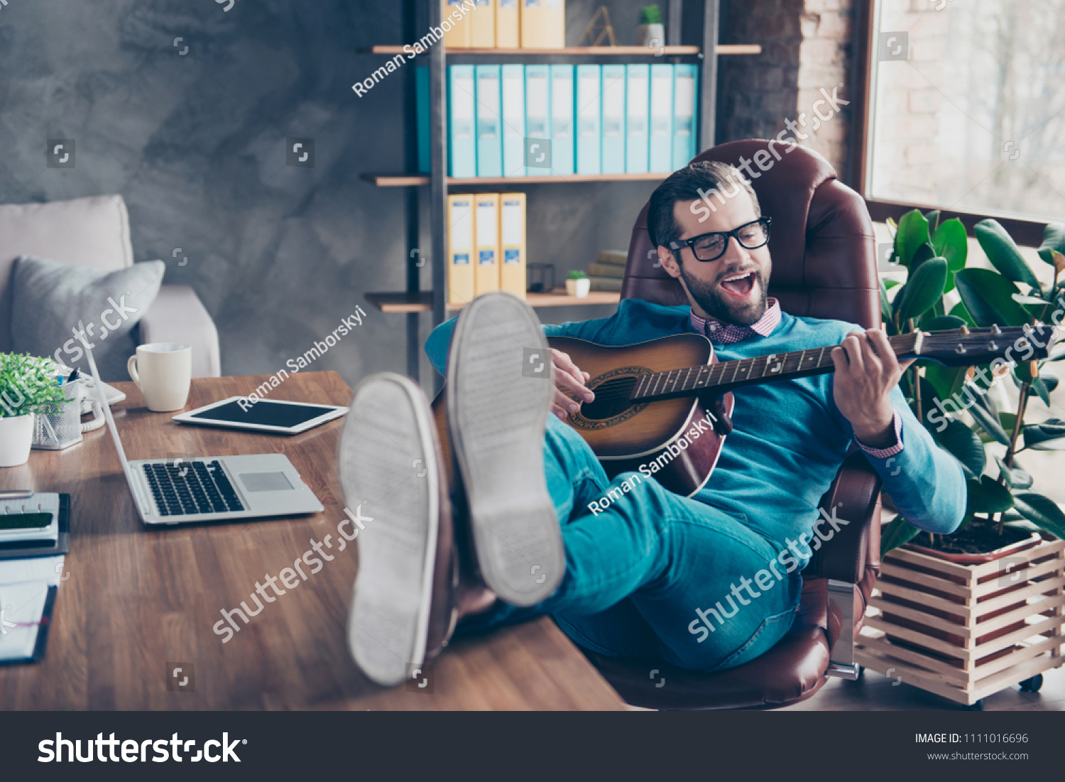 Cheerful Creative Man Sitting Desktop On Stock Photo 1111016696 ...