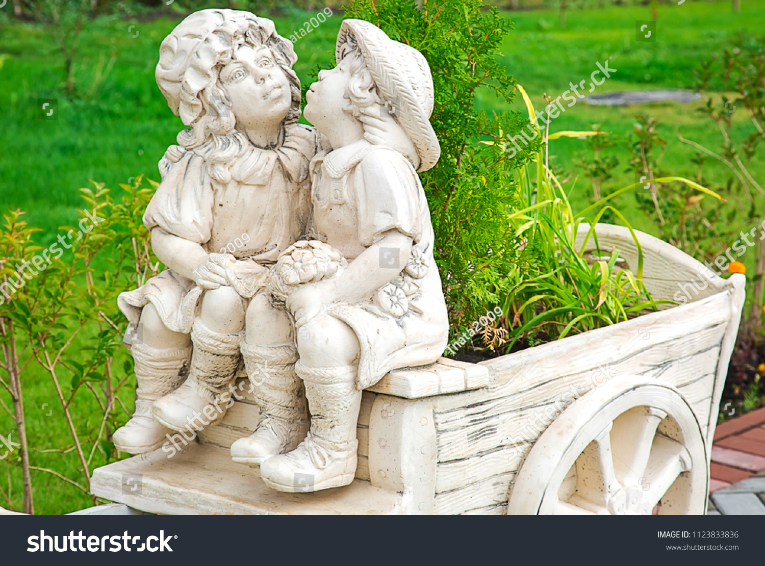 Photo Kissing Statues Boy Girl City Stock Photo 1123833836 Shutterstock   Stock Photo Photo Of Kissing Statues Of A Boy And A Girl In A City Park Among Green Plantations 1123833836 