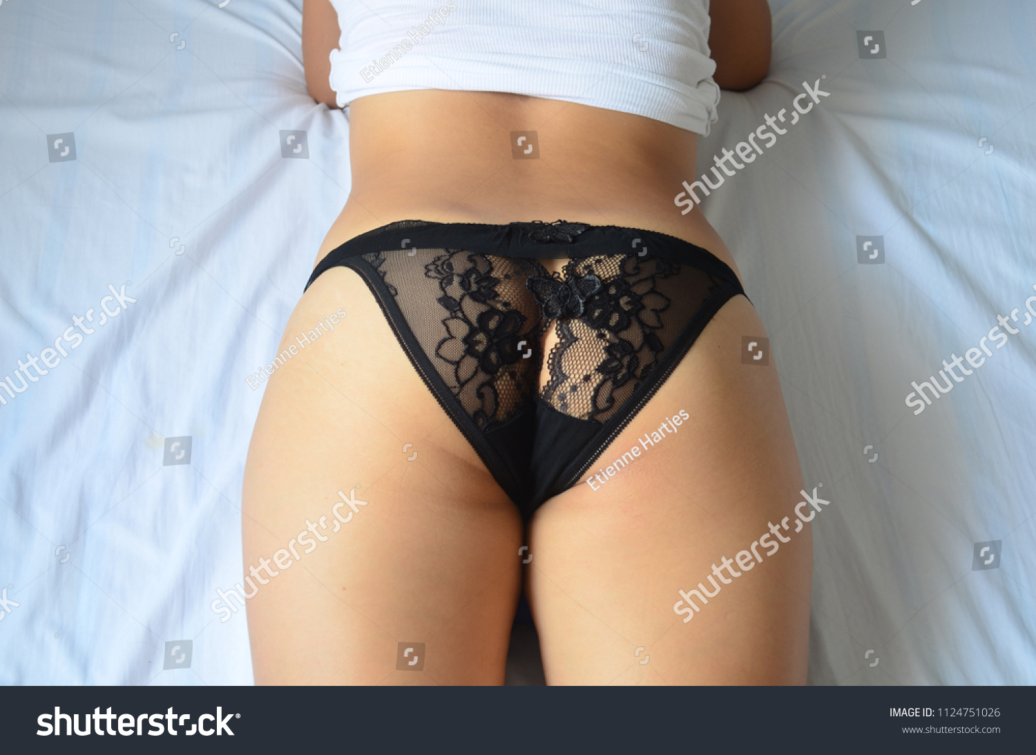Womans Butt Lying On Stock Photo