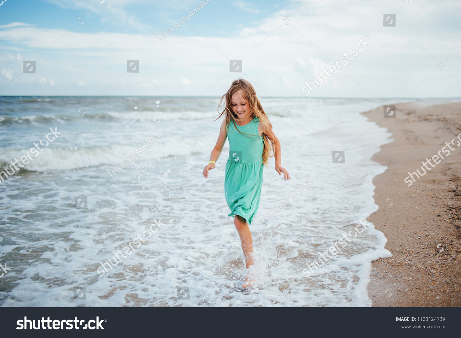 Beautiful Little Girl On Beach Funny Stock Photo 1128124739 | Shutterstock