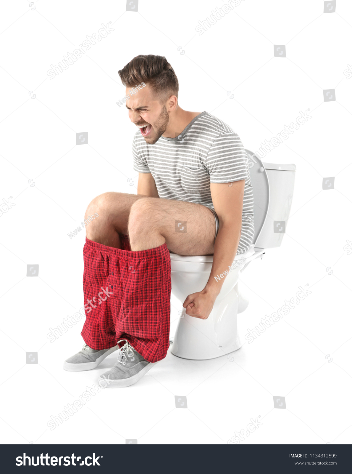 Young Man Suffering Diarrhea On Toilet Stock Photo 1134312599 ...