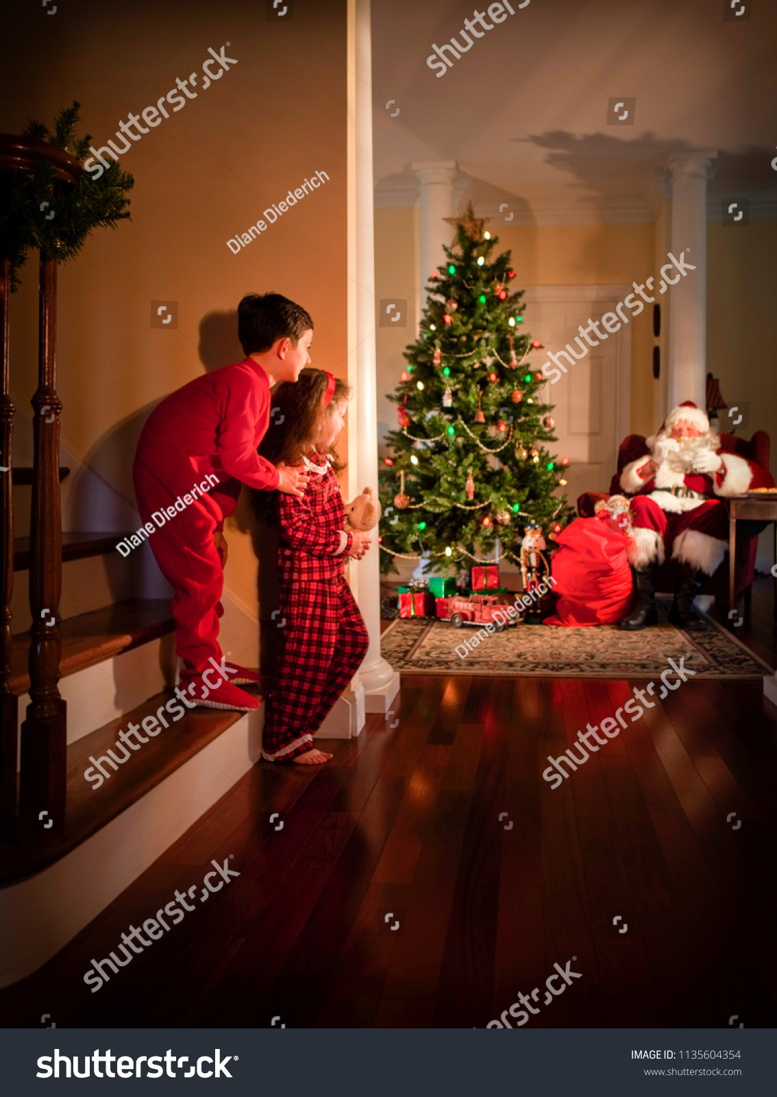 Children Peeking Around Corner Santa Claus Stock Photo 1135604354 ...