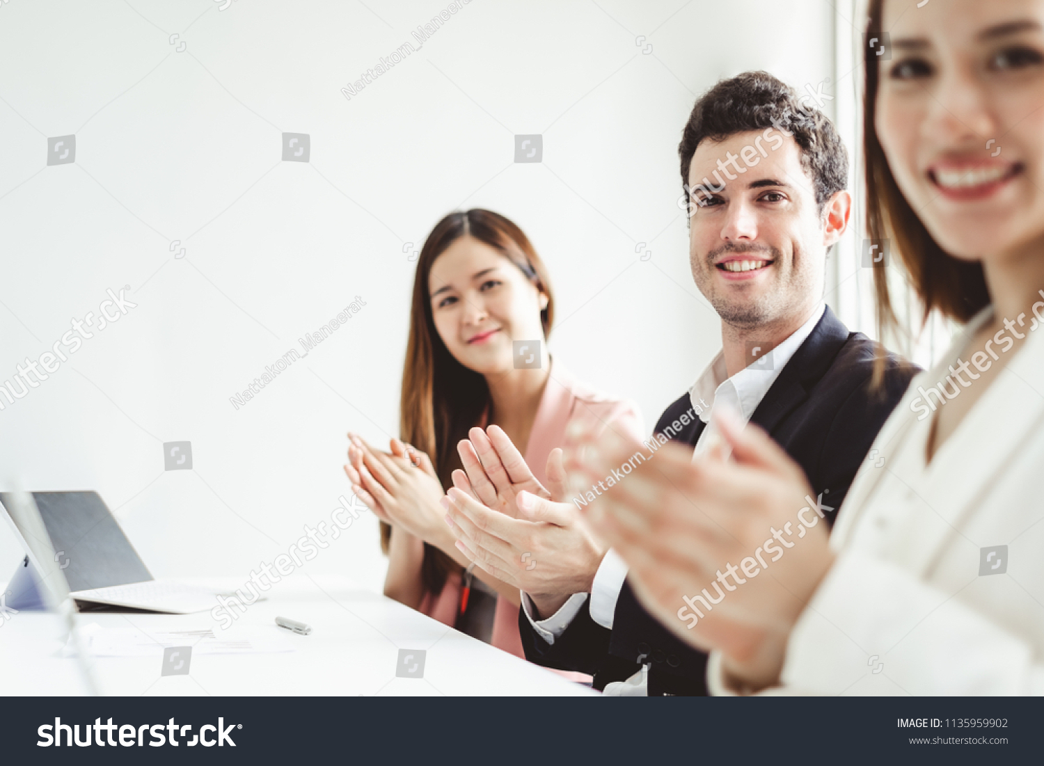 Business People Clapping Hands During Meeting Stock Photo 1135959902 ...