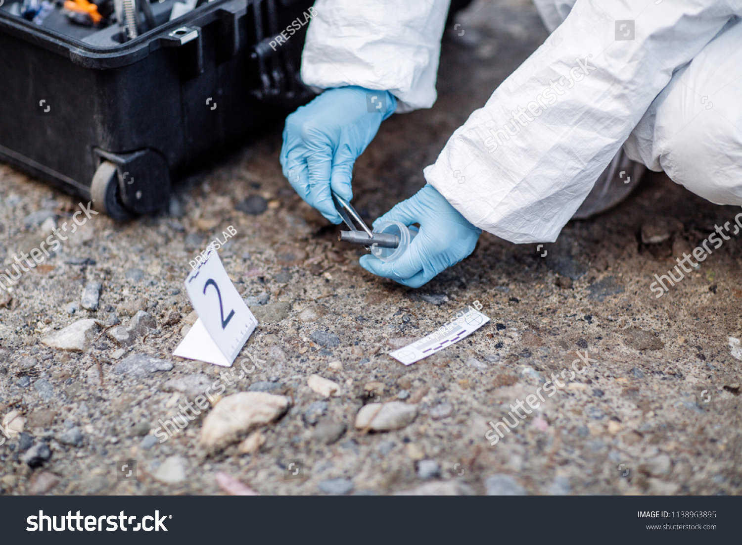 Criminological Expert Collecting Evidence Crime Scene Stock Photo ...