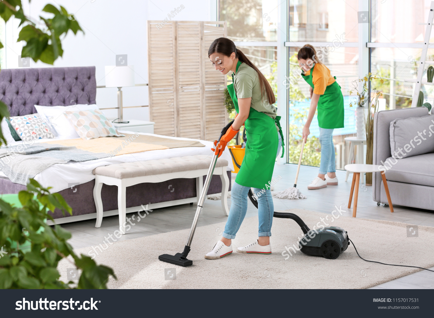 Team Professional Janitors Uniform Cleaning Bedroom Stock Photo