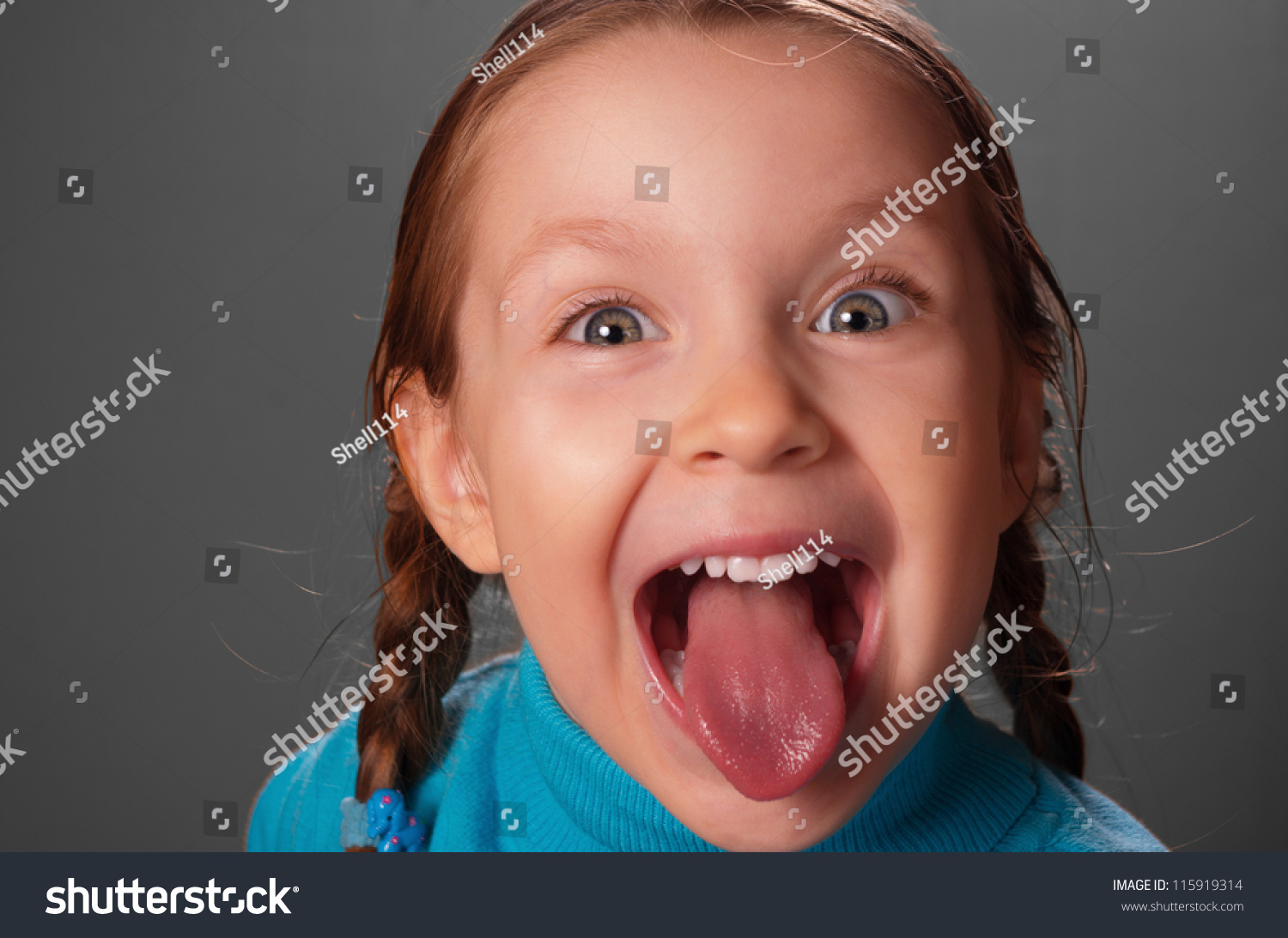 Little Girl Showing Tongue Against Grey Stock Photo 115919314 ...