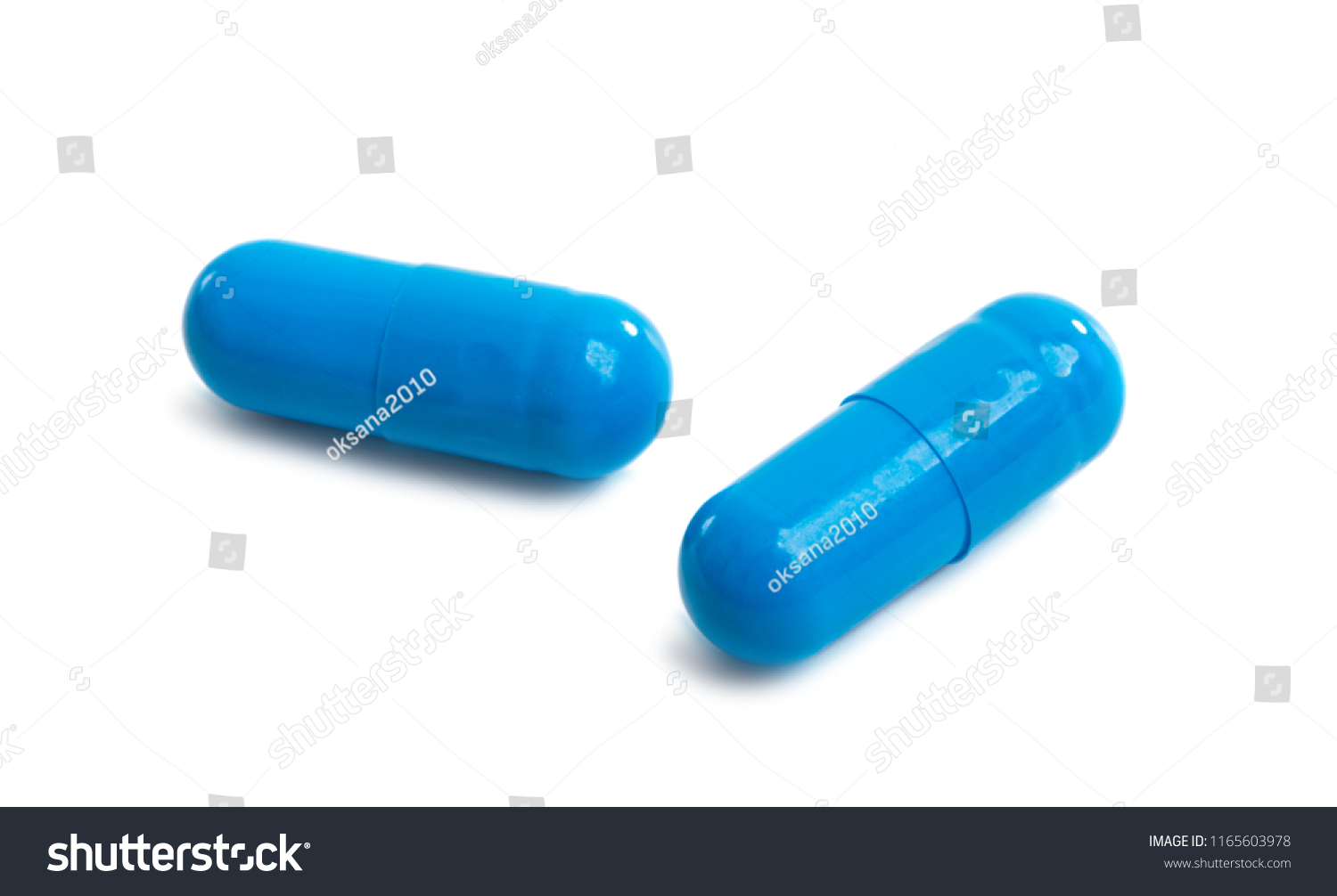 Blue Capsules Isolated On White Background Foto Stok 1165603978 Shutterstoc...