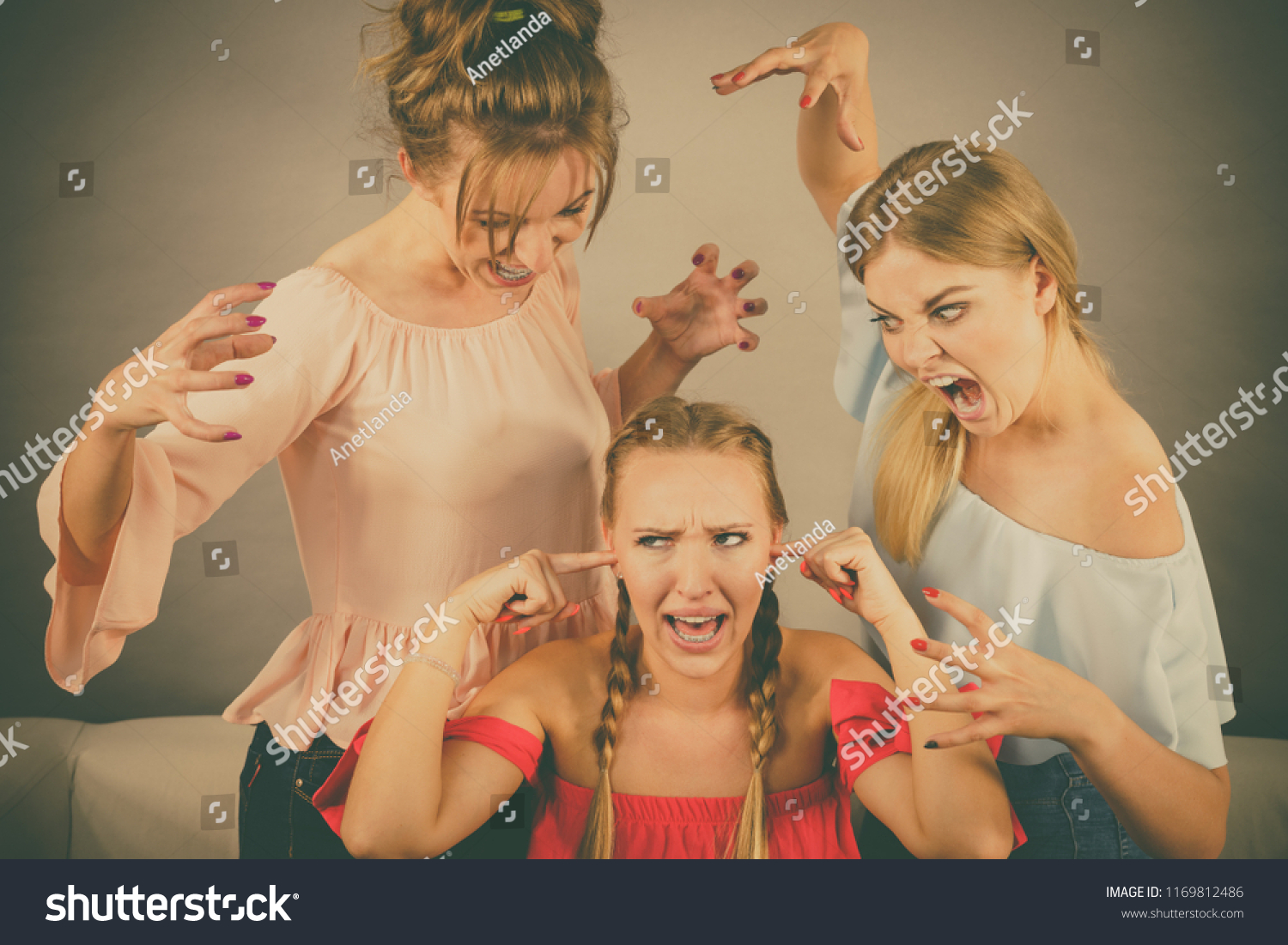 Woman Being Bullied By Her Two库存照片1169812486 Shutterstock 