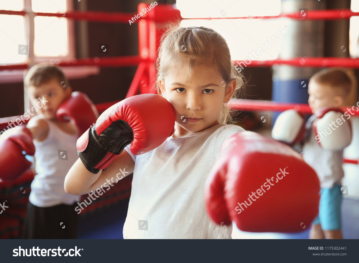 Stock Photo Little Girl In Boxing Gloves On Ring 1175302441 