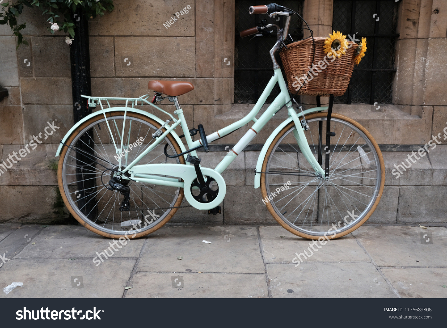 light blue bike with basket