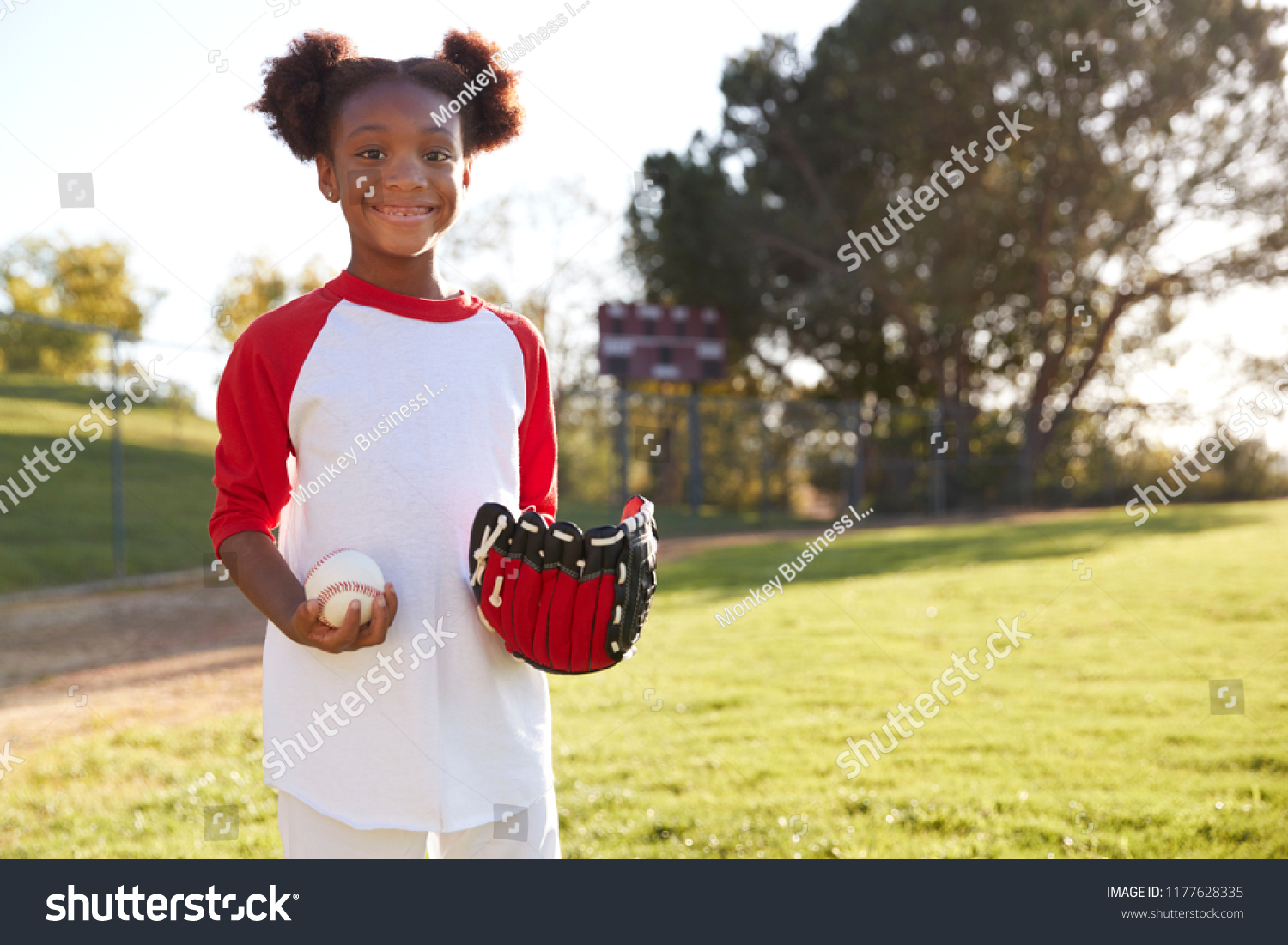 Young Black Girl Holding Baseball Mitt Stock Photo 1177628335 ...