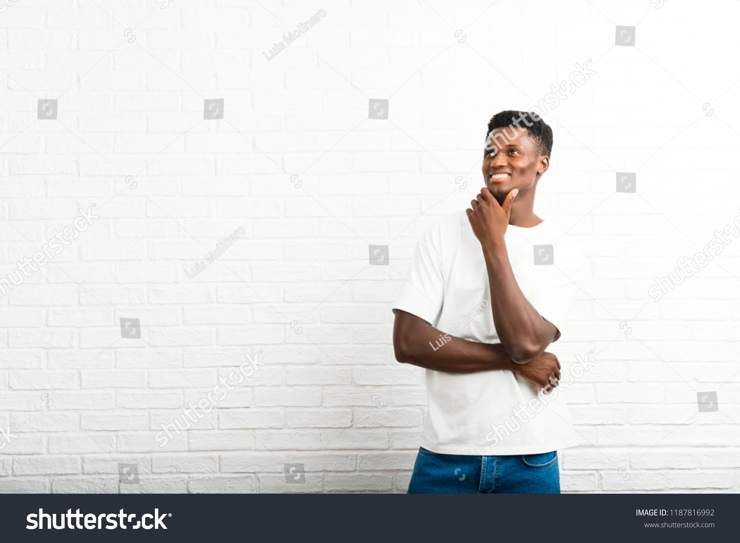 Dark Skinned Man Standing Thinking Idea Stock Photo 1187816992 