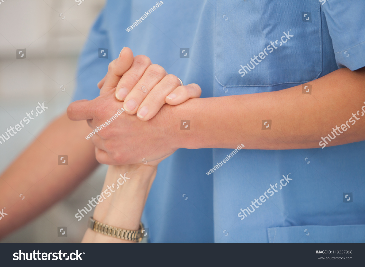 nurse-holding-hands-take-care-elderly-stock-photo-119357998-shutterstock