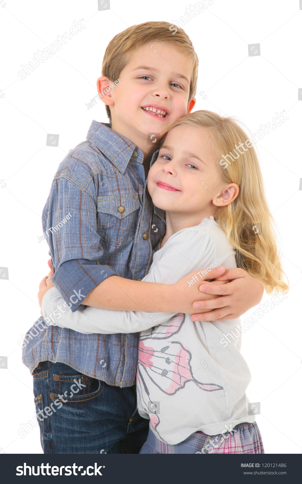 brother and sister hugging