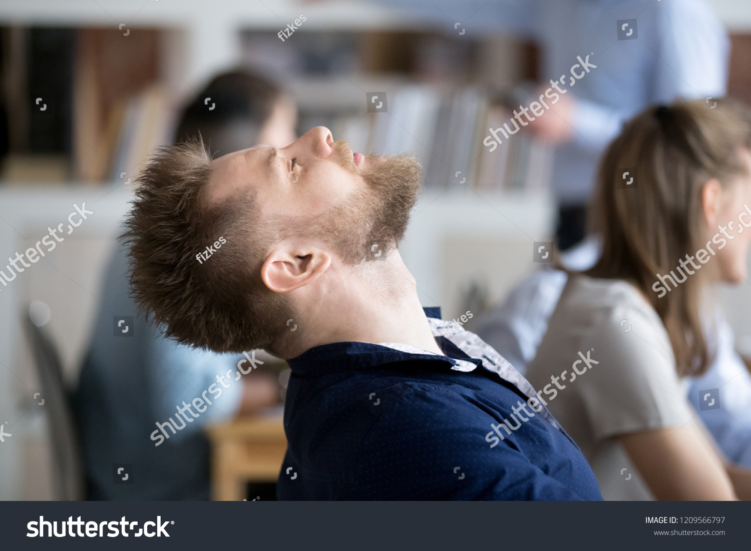 Tired Male Employee Throw Head Back Stock Photo 1209566797 Shutterstock