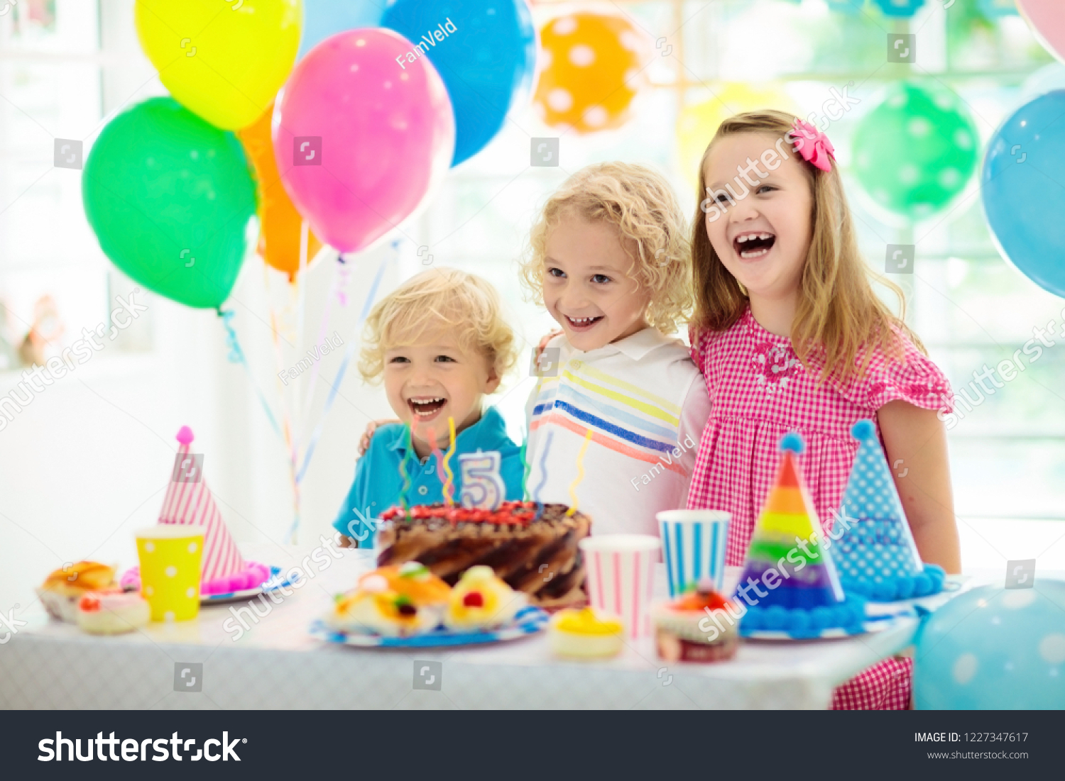 Kids Birthday Party Child Blowing Out Stock Photo 1227347617 | Shutterstock