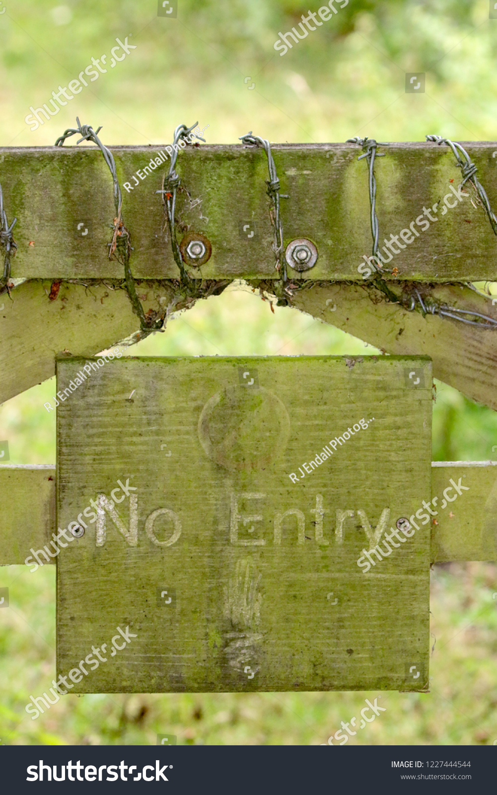 no-entry-sign-on-gate-barbed-stock-photo-1227444544-shutterstock