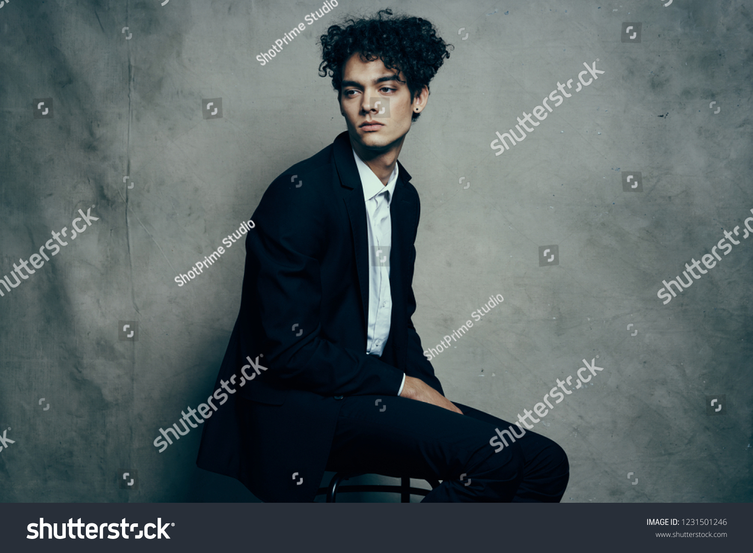 Man Black Suit Sits On Chair Stock Photo 1231501246 | Shutterstock