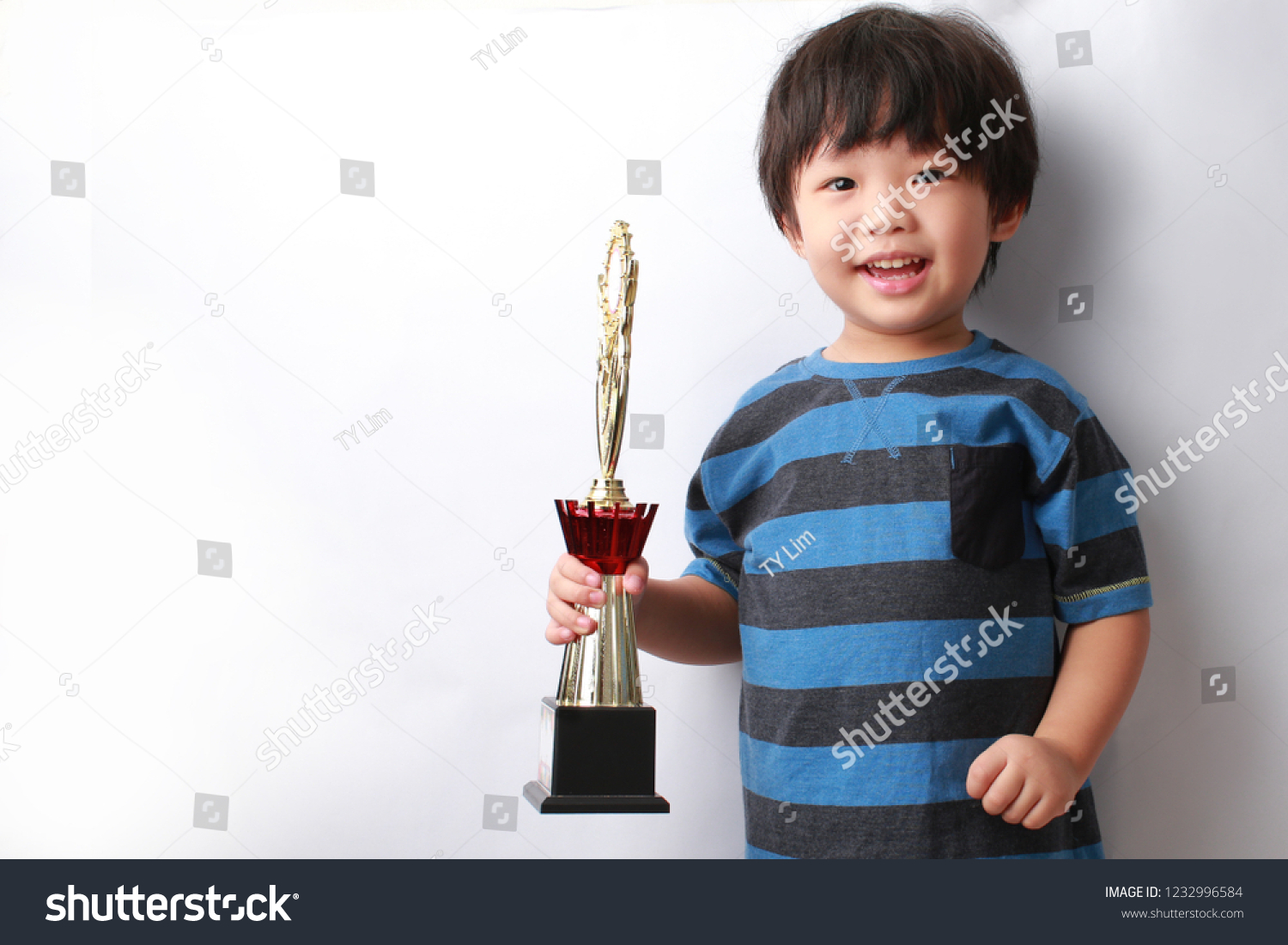 Smart Little Asian Boy Holding Trophy Stock Photo 1232996584 | Shutterstock