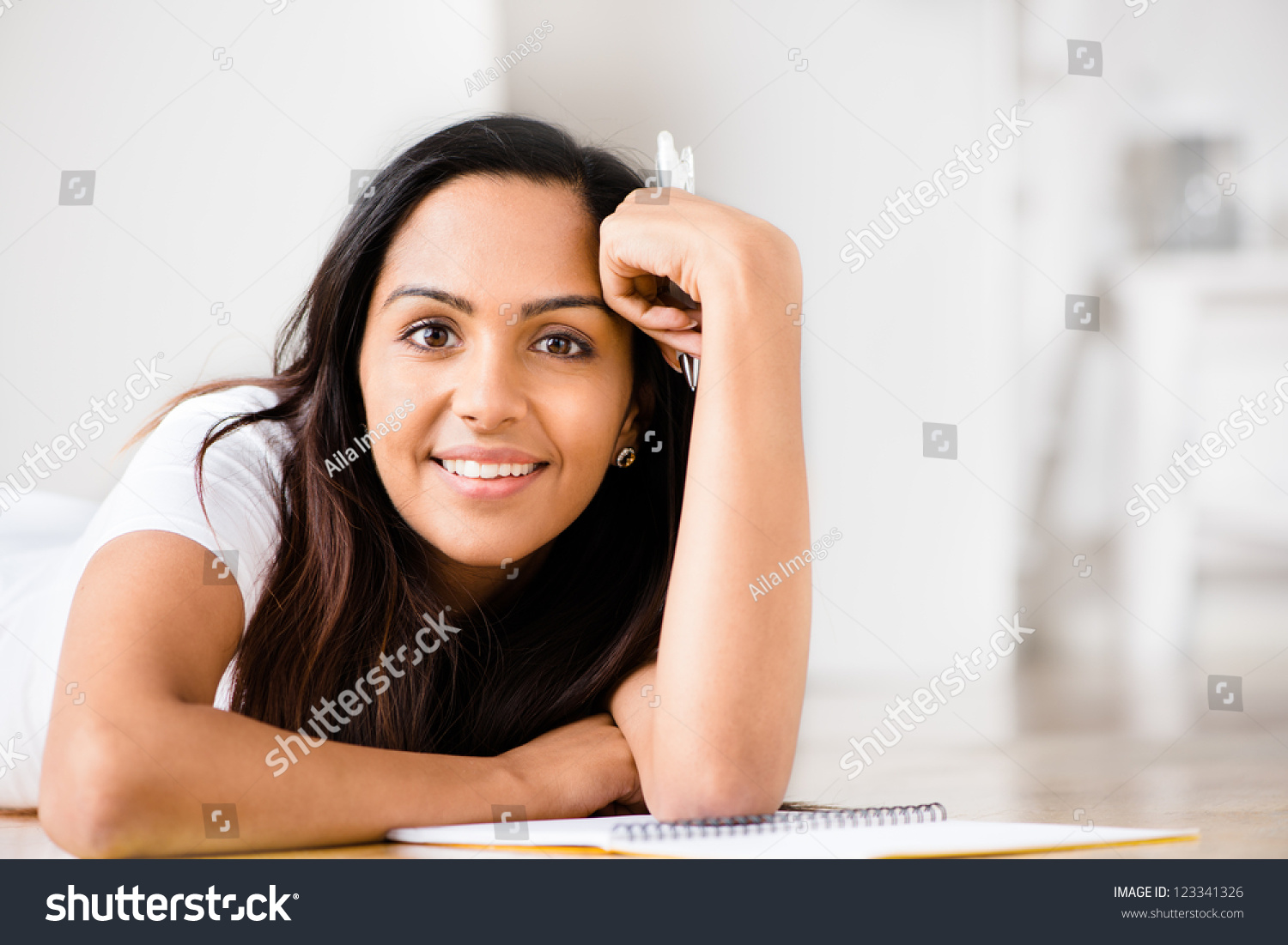 indian-woman-student-education-writing-studying-stock-photo-123341326