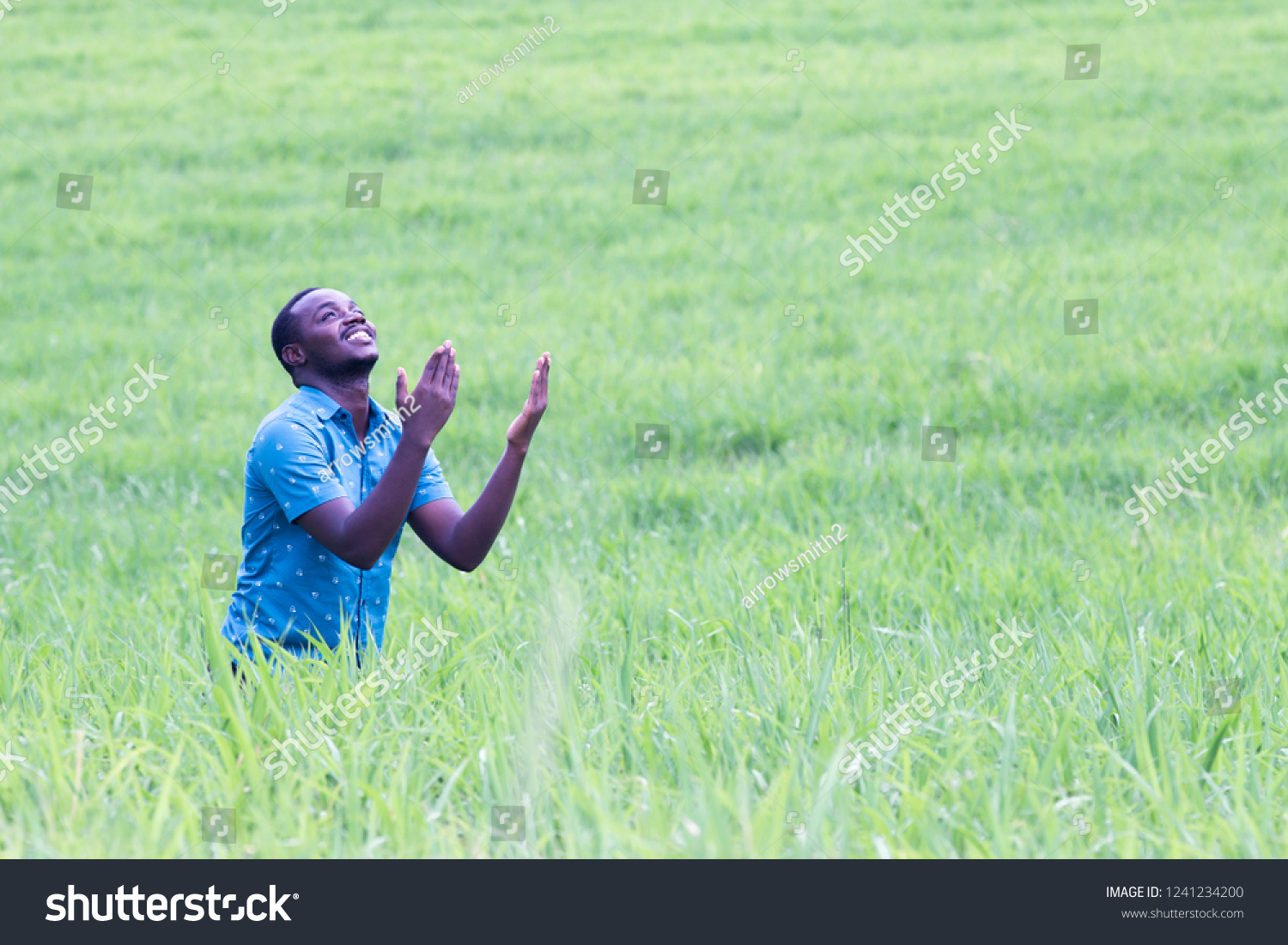 african-man-praying-thank-god-stock-photo-1241234200-shutterstock