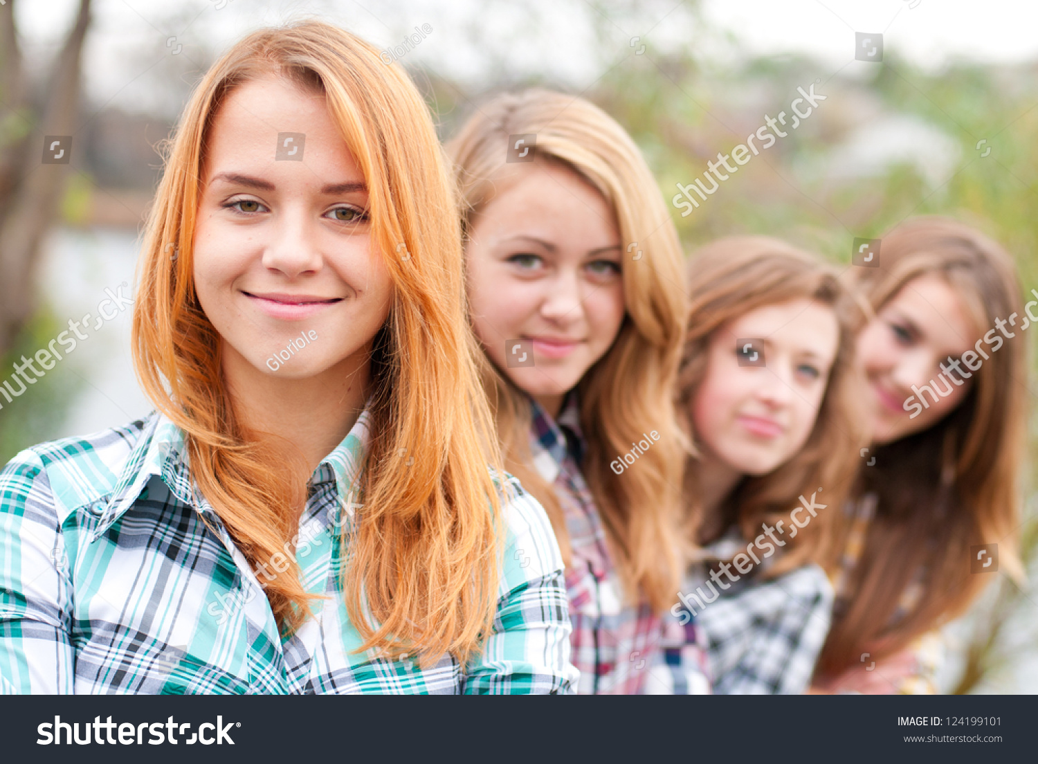 Four Happy Teenage Girls Friends Outdoors Stock Photo 124199101 ...