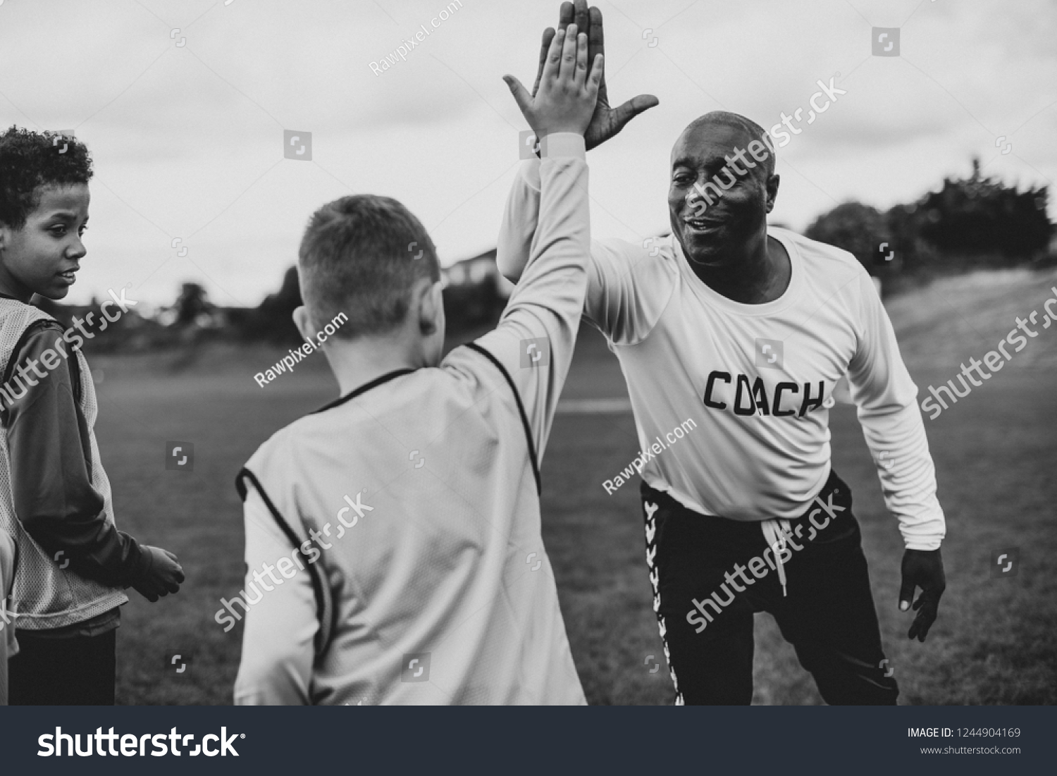 Football Coach Doing High Five His Stock Photo 1244904169 | Shutterstock