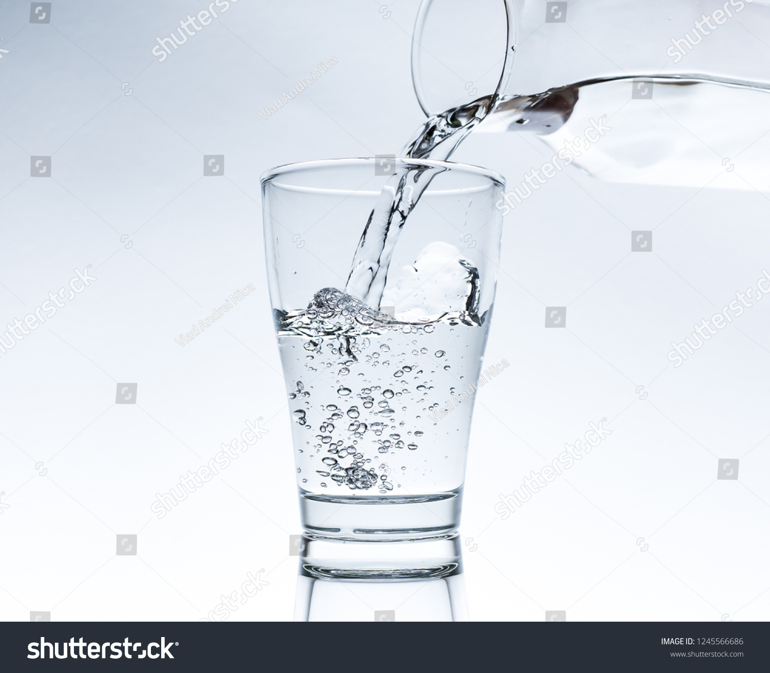 Pouring Water Jar Into Glass Stock Photo 1245566686 | Shutterstock