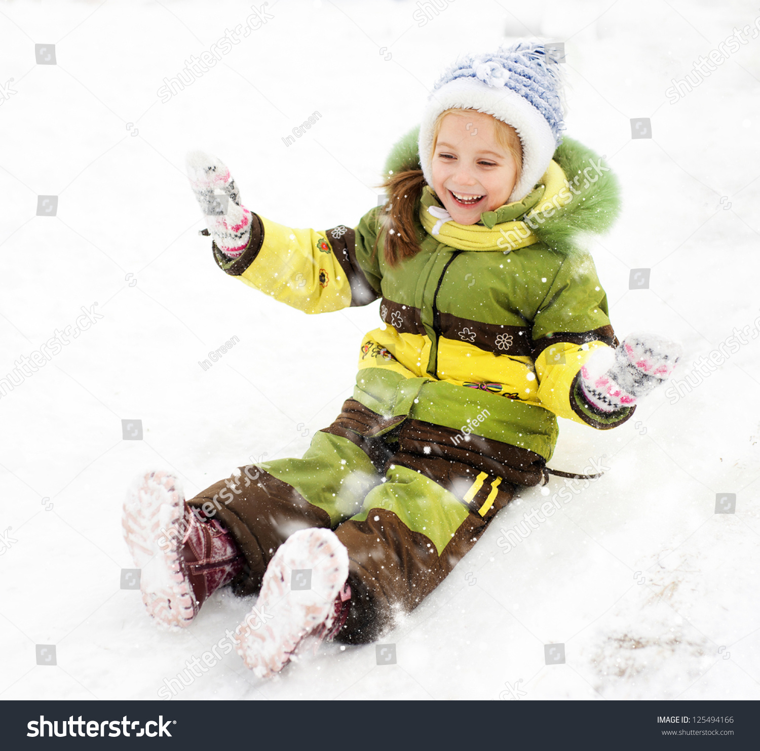 Smiling Little Girl On Ice Slide Stock Photo 125494166 | Shutterstock