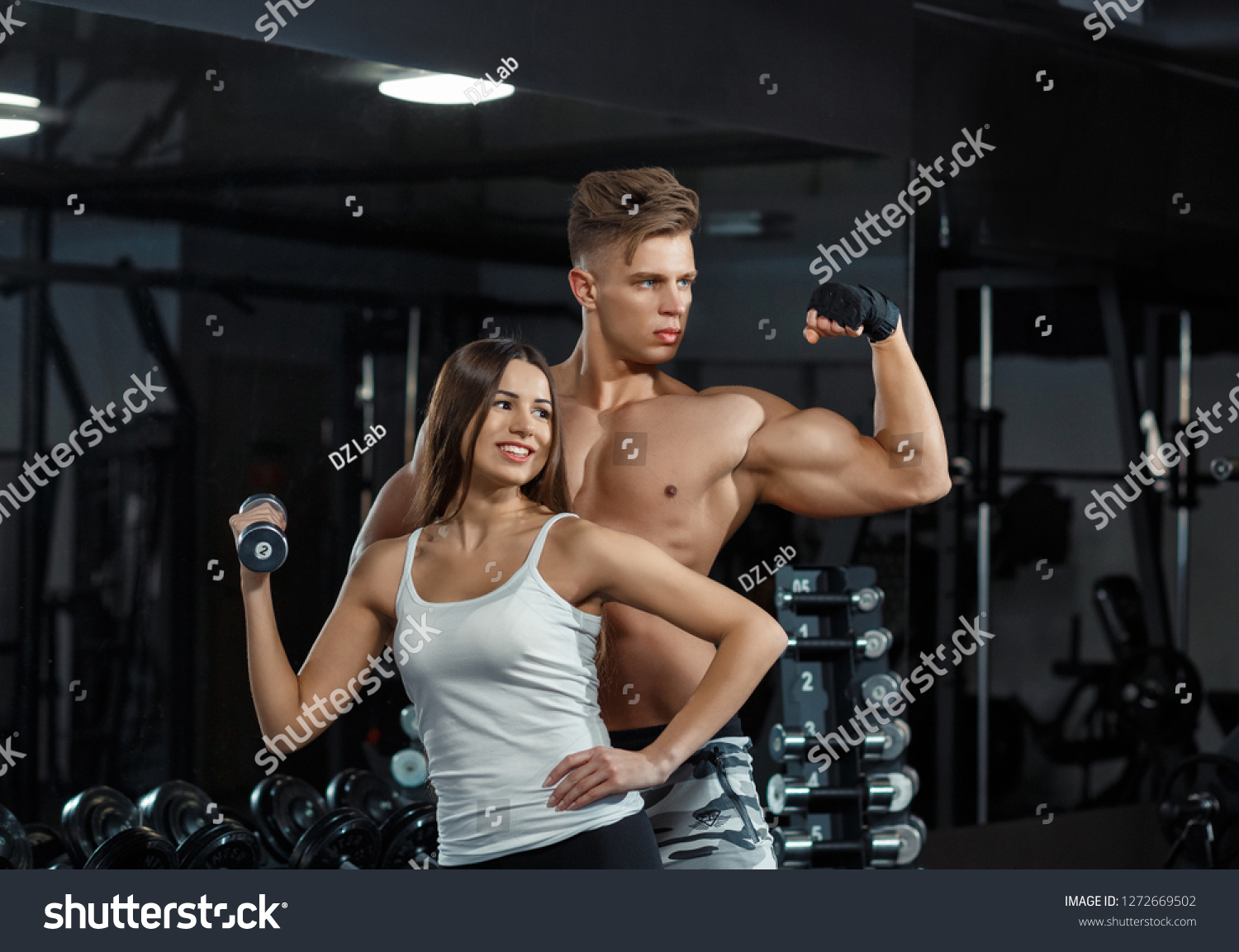 Beautiful Young Sporty Sexy Couple Showing Stock Photo 1272669502