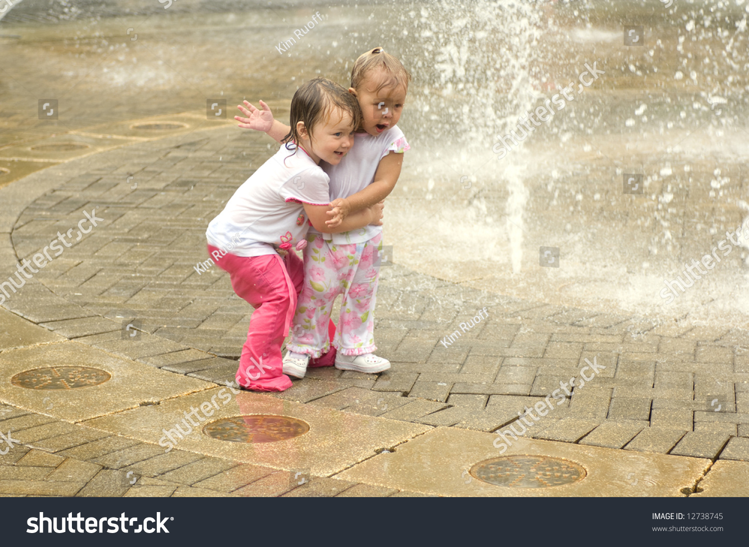 Little Girls Playing Water Stock Photo 12738745 | Shutterstock