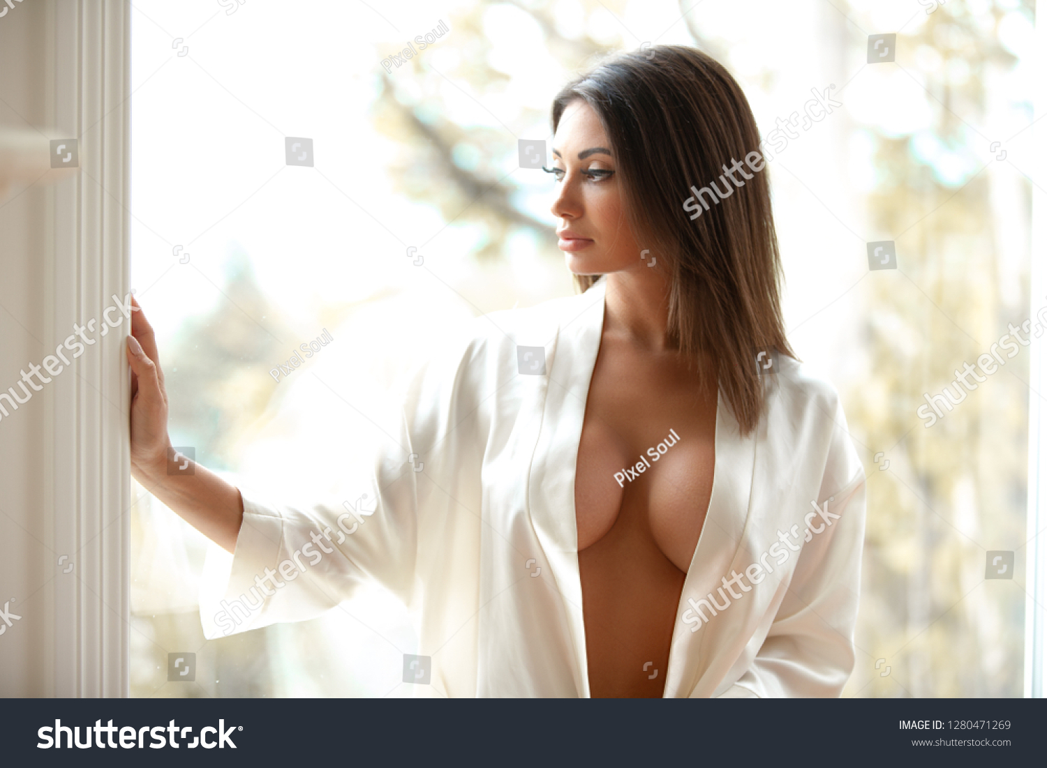 Sexy Young Woman Silk Robe Stock Photo pic