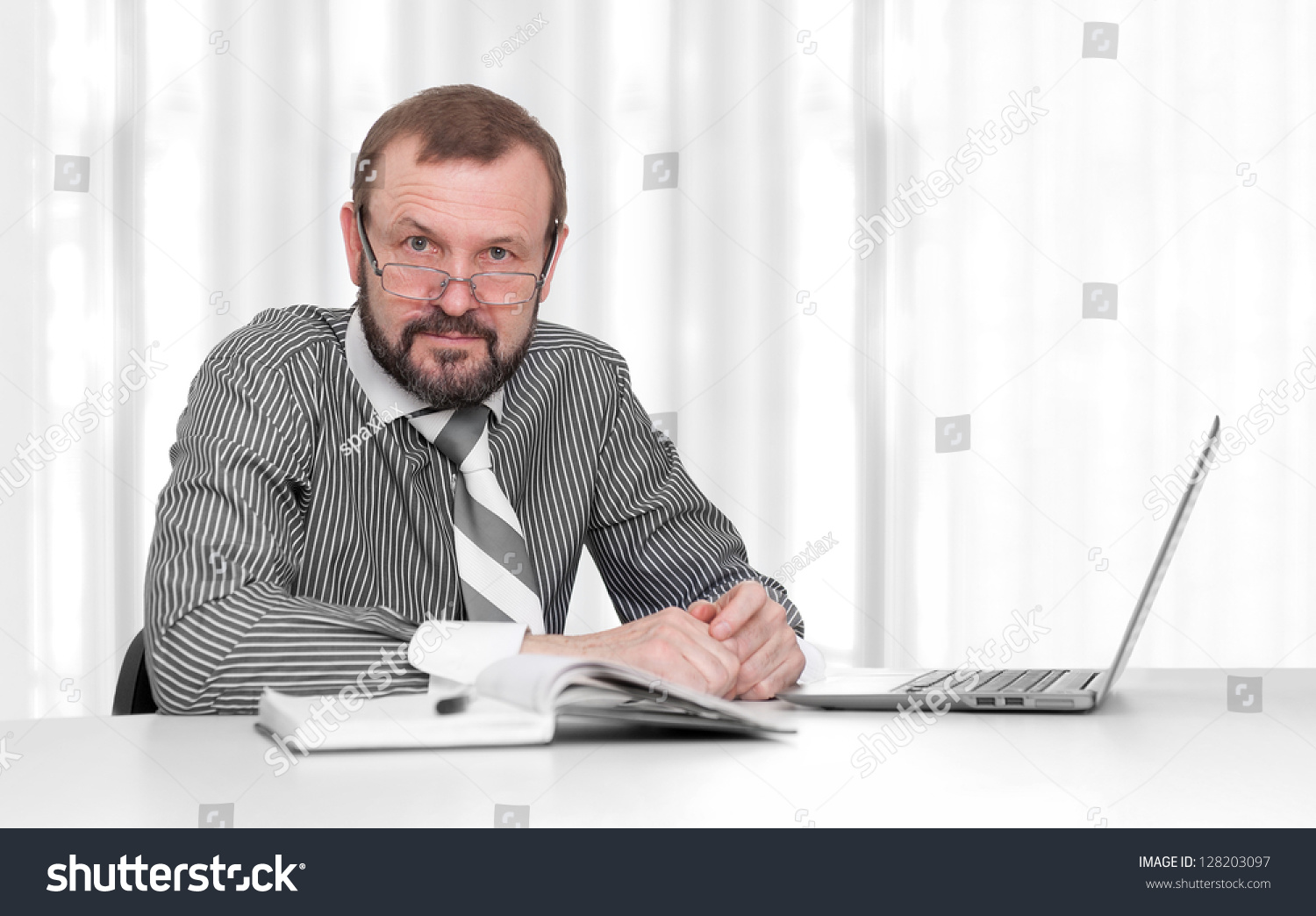 Senior Business Man Sitting By His Stock Photo 128203097 | Shutterstock