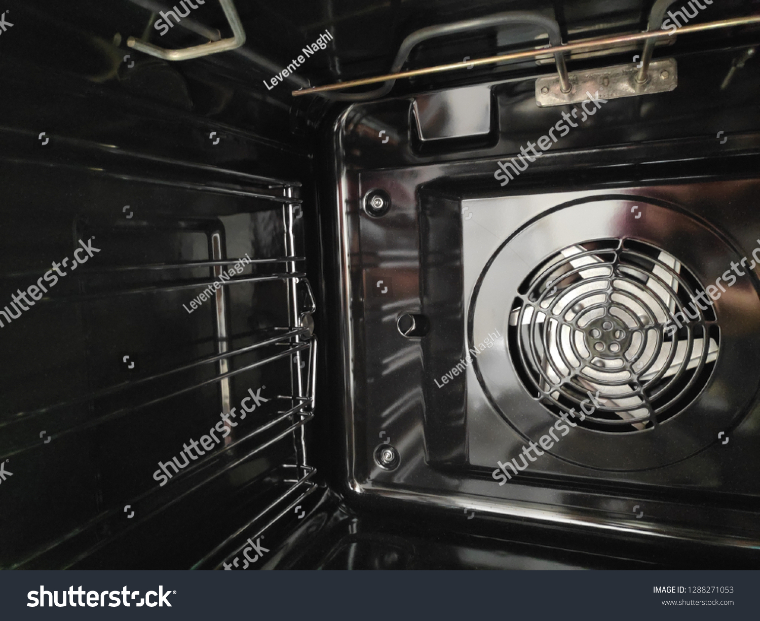 13 Fan Forced Oven Images Stock Photos Vectors Shutterstock   Stock Photo Interior Shot Of A Freestanding Electric Cooker With Flat Cavity Wire Side Grid And Fan 1288271053 