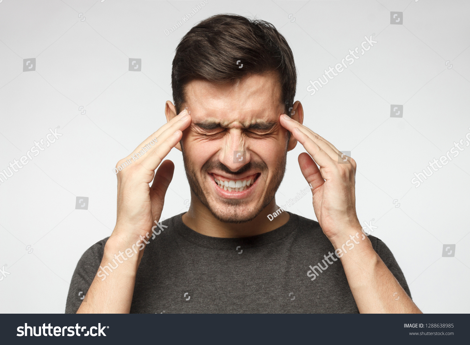 Young Man Suffering Headache Pressing Fingers Stock Photo 1288638985 ...