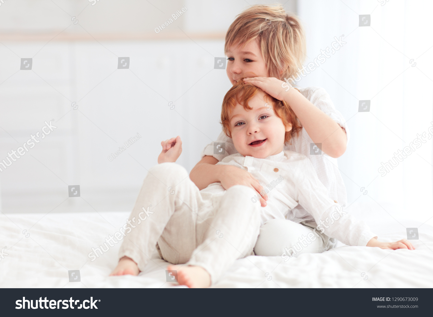 Two Beautiful Kids Brothers Cuddling Playing Stock Photo 1290673009 ...