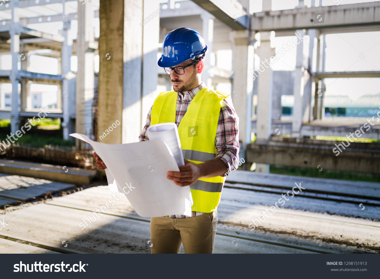 Picture Construction Site Engineer Looking Plan Stock Photo 1298151913 ...