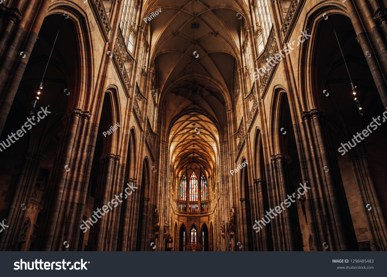 Stock Photo Interior Of Gothic Cathedral Inside Carved Pulpit Stained Glass Windows Through Which Light Rays 1298485483 