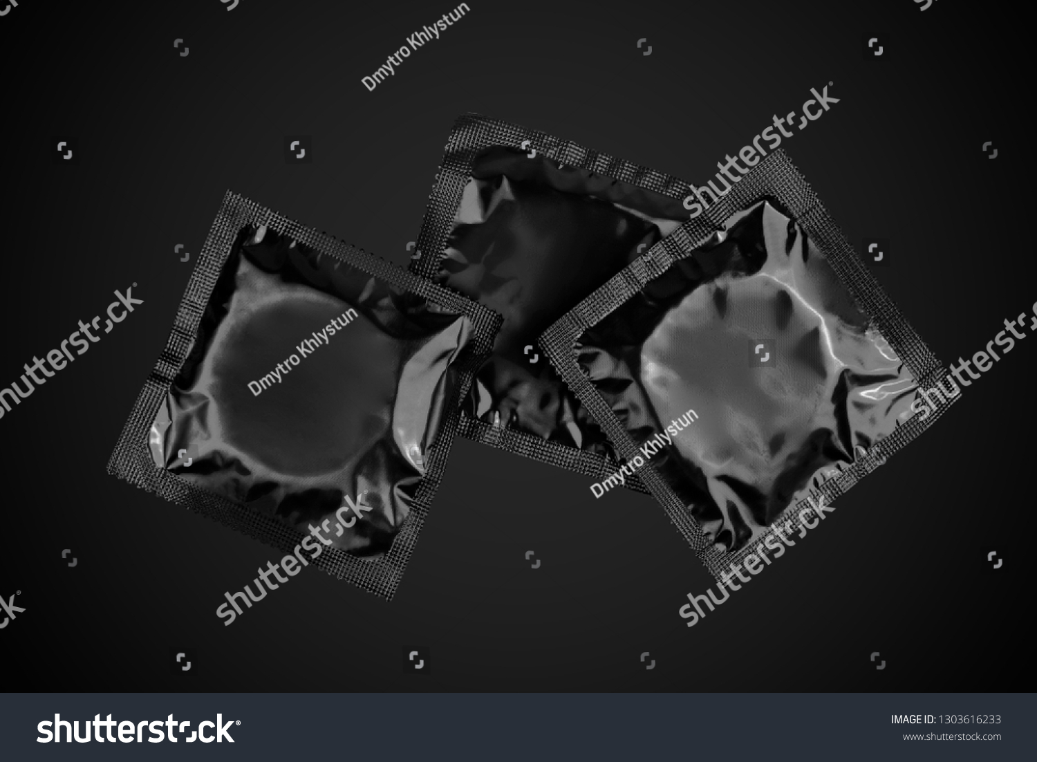 Black Condoms Black Background Stock Photo 1303616233 | Shutterstock