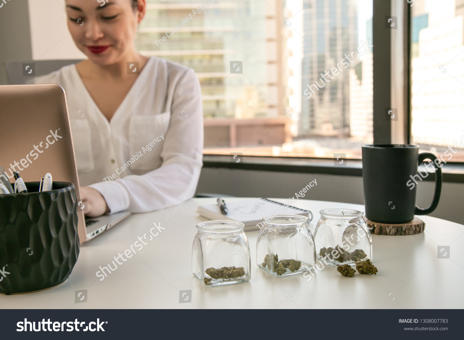 Female Cannabis Entrepreneur Working On Marketing Stock Photo ...