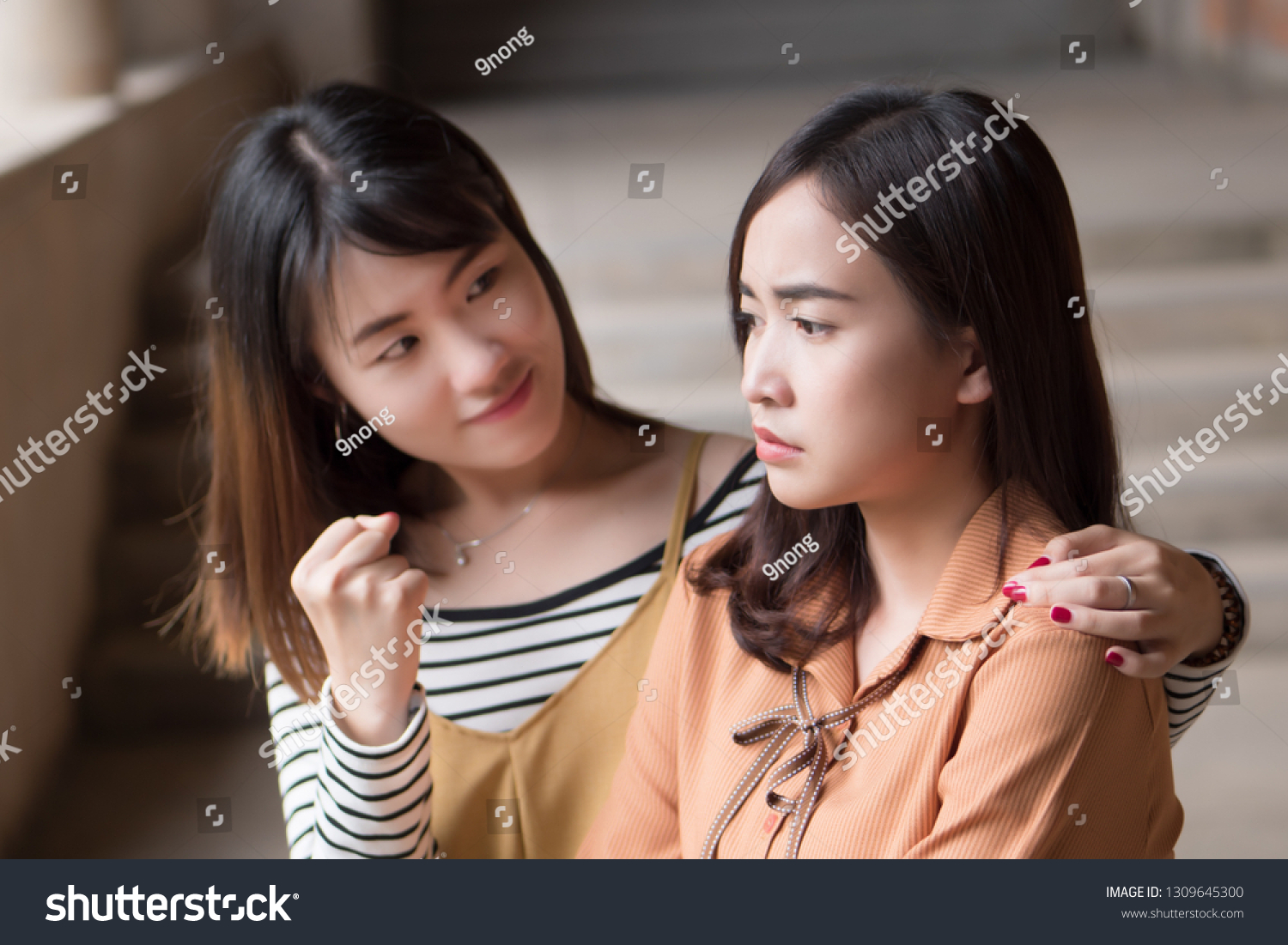 Asian Woman Getting Encoragement Her pic