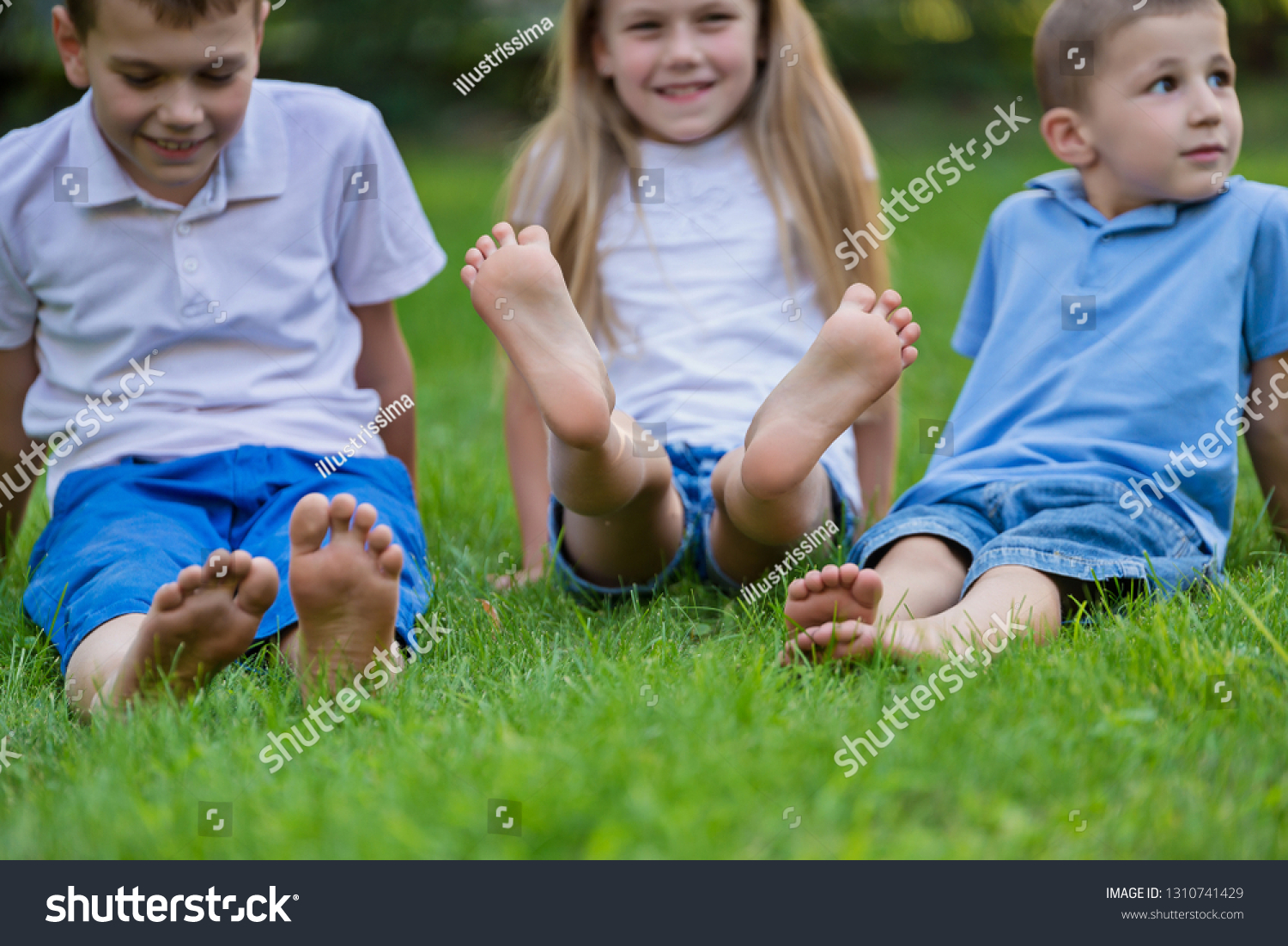 Happy Children Show Their Feet Close Stock Photo 1310741429 | Shutterstock